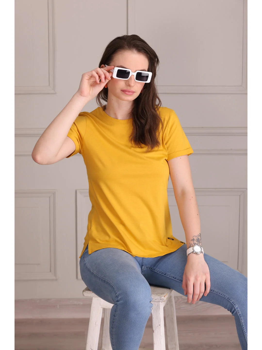 Mustard plain t shirts for women Sitting pose