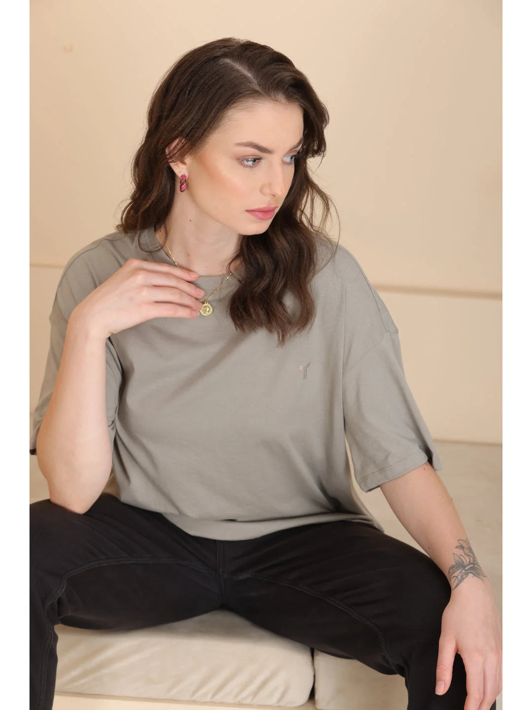 Ash Oversized t shirt for women sitting pose 
