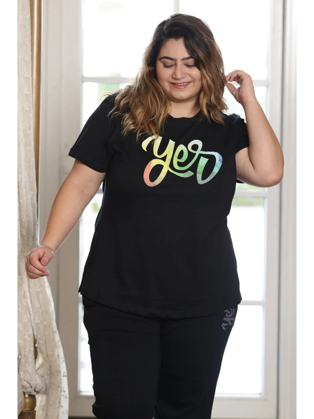 Black plus size night suit for ladies model pose 