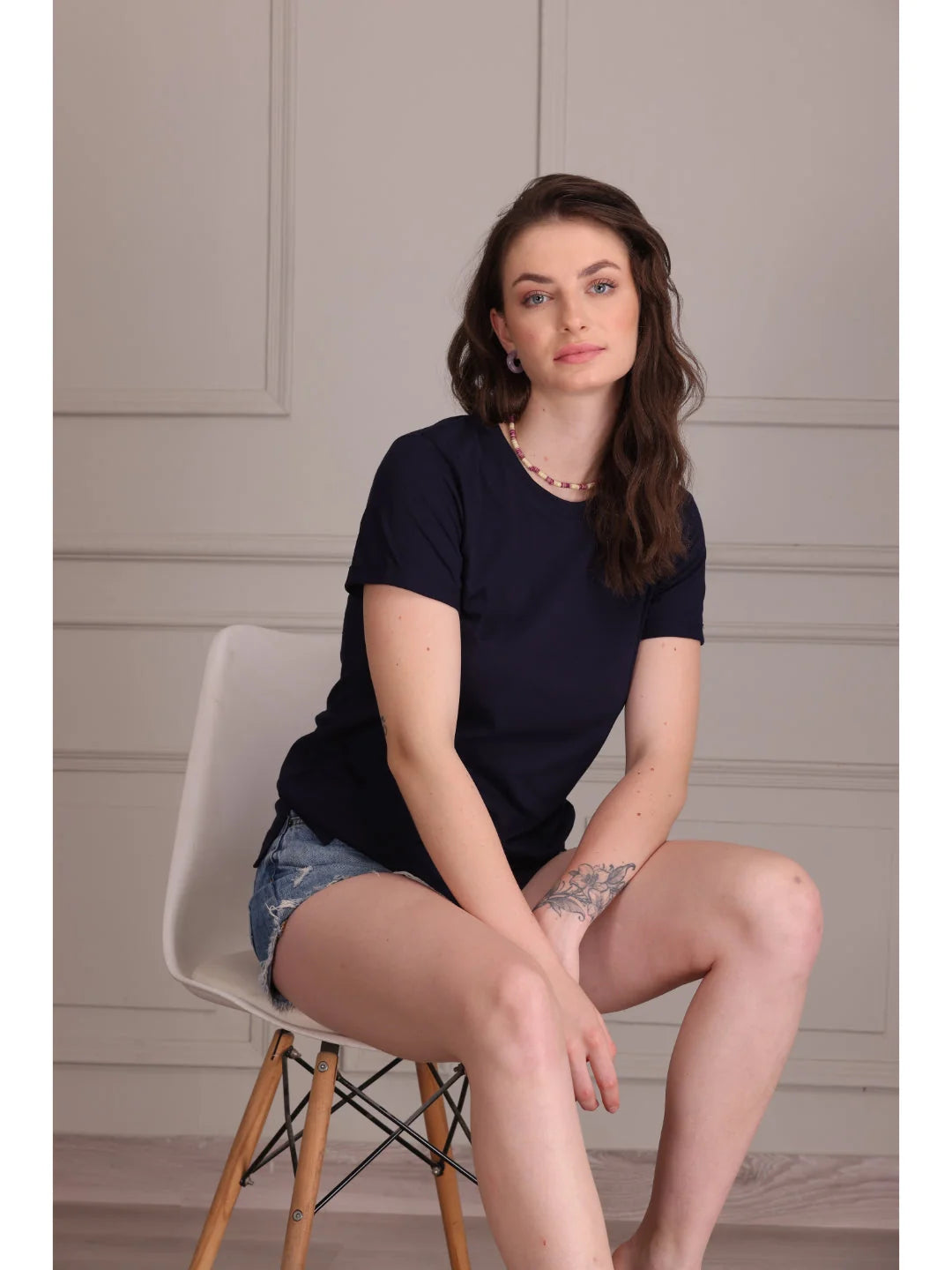 Navy Blue plain t shirts for women Sitting pose 