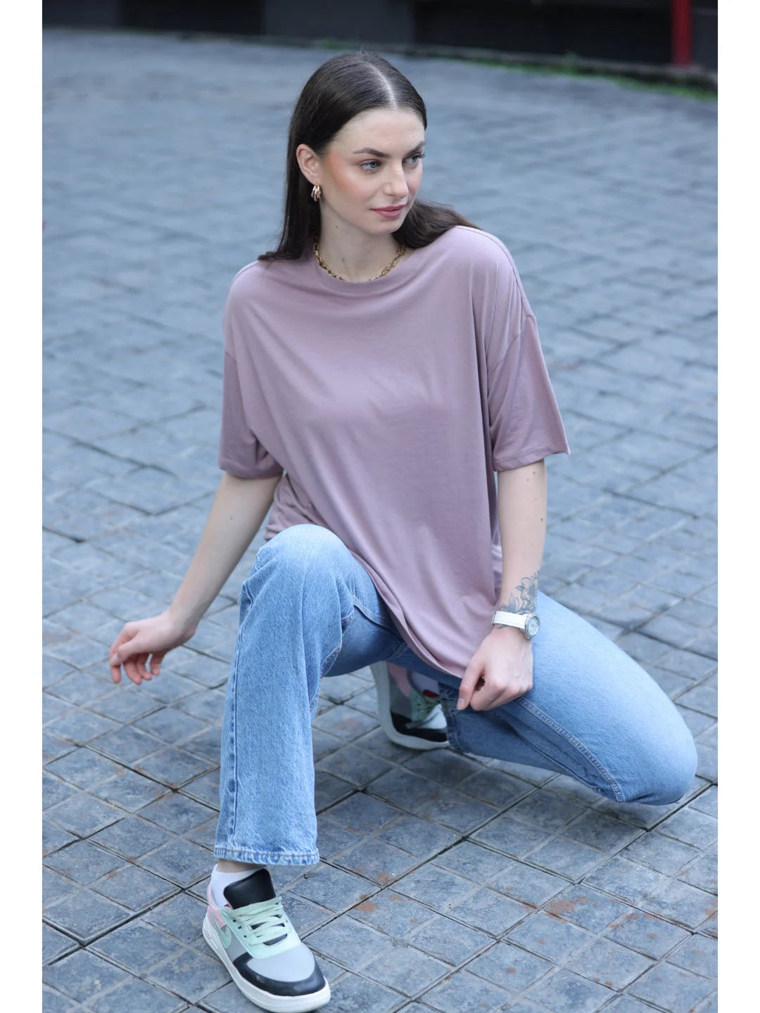 bronze plain t shirts for women sitting pose 